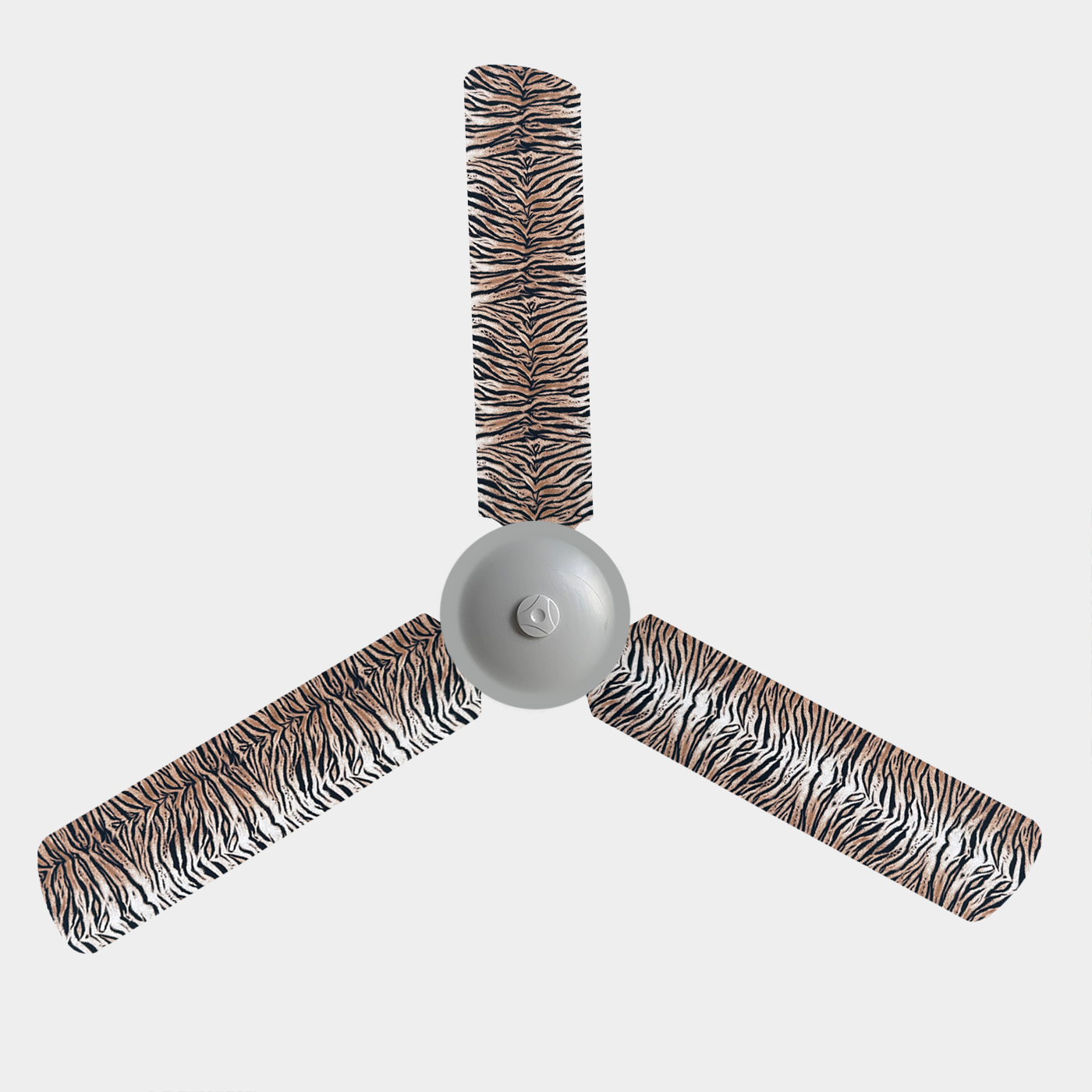 Tiger print fabric fan blade covers on a 3 blade ceiling fan