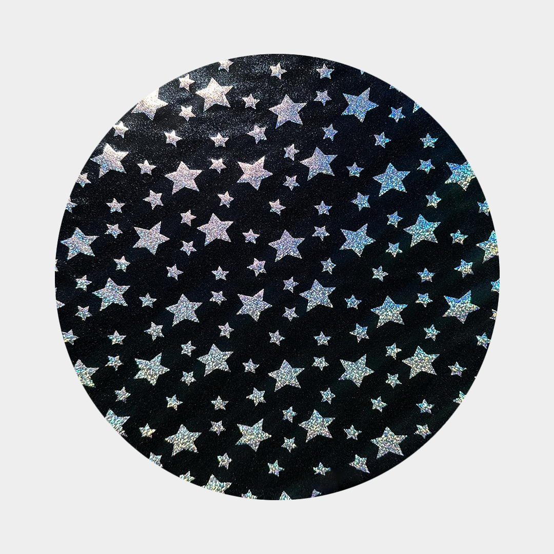 Image of the fabric used in Twinkle Little Star design fan blade covers. Black with holographic stars