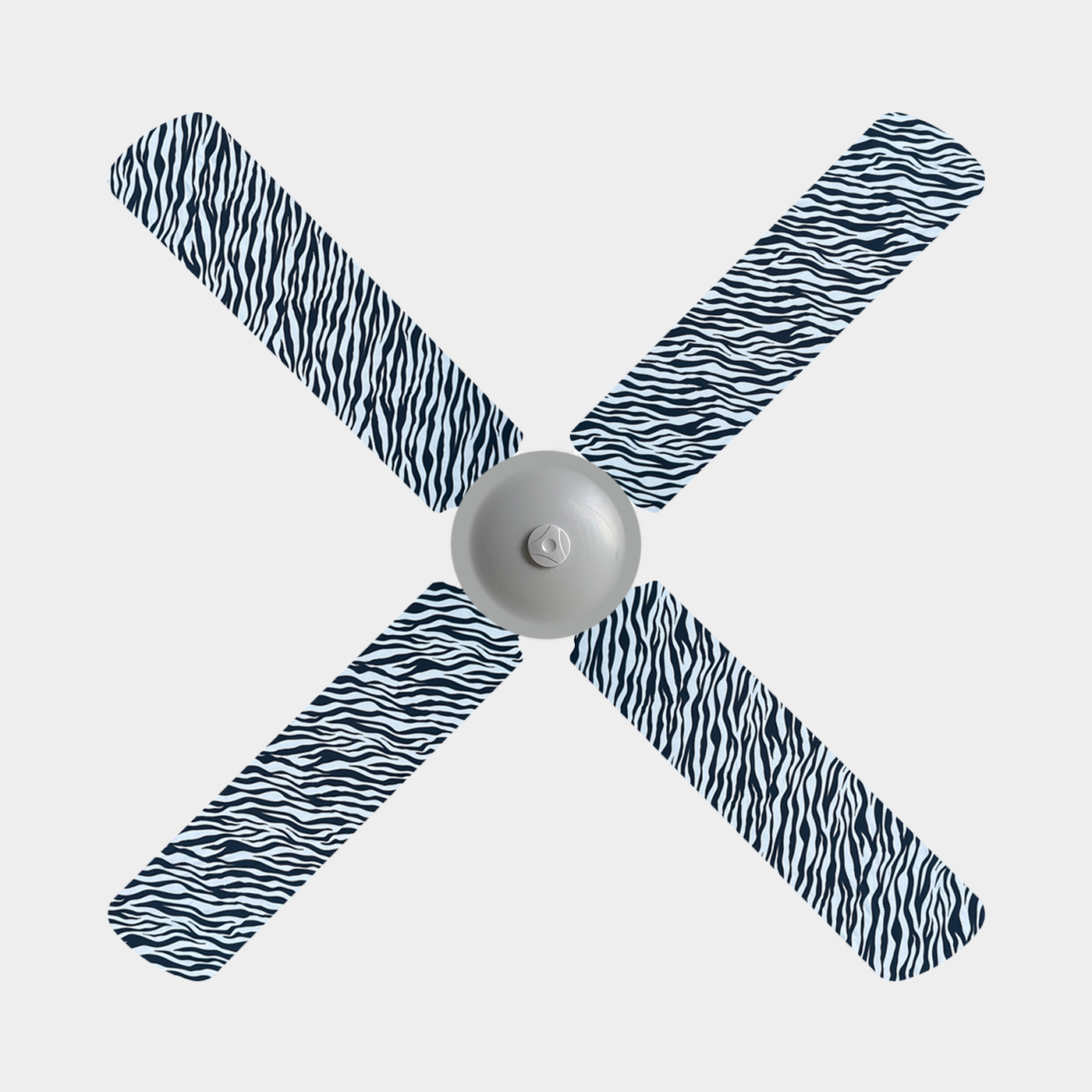 Zebra print fabric fan blade covers on a 4 blade ceiling fan