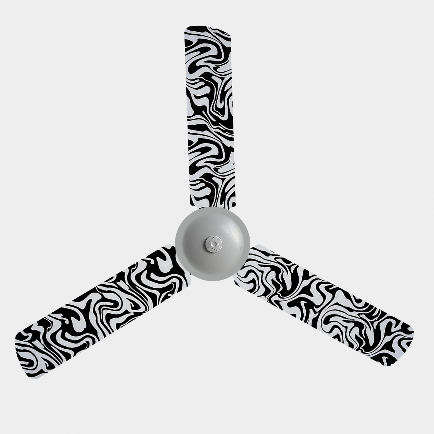 Black and white swirling design fabric fan blade covers on a 3 blade ceiling fan