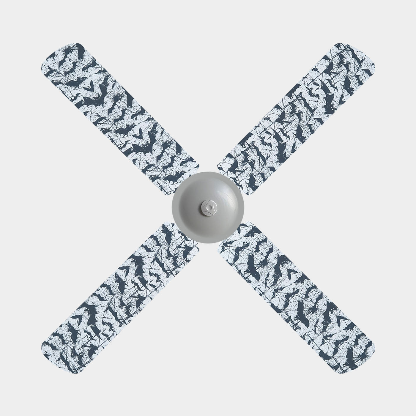 A 3 blade ceiling fan with fabric covers with the design of black bats on a white background