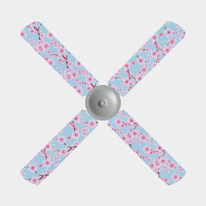 Cherry blossom fan blade covers on a blue background shown on a 4 blade ceiling fan