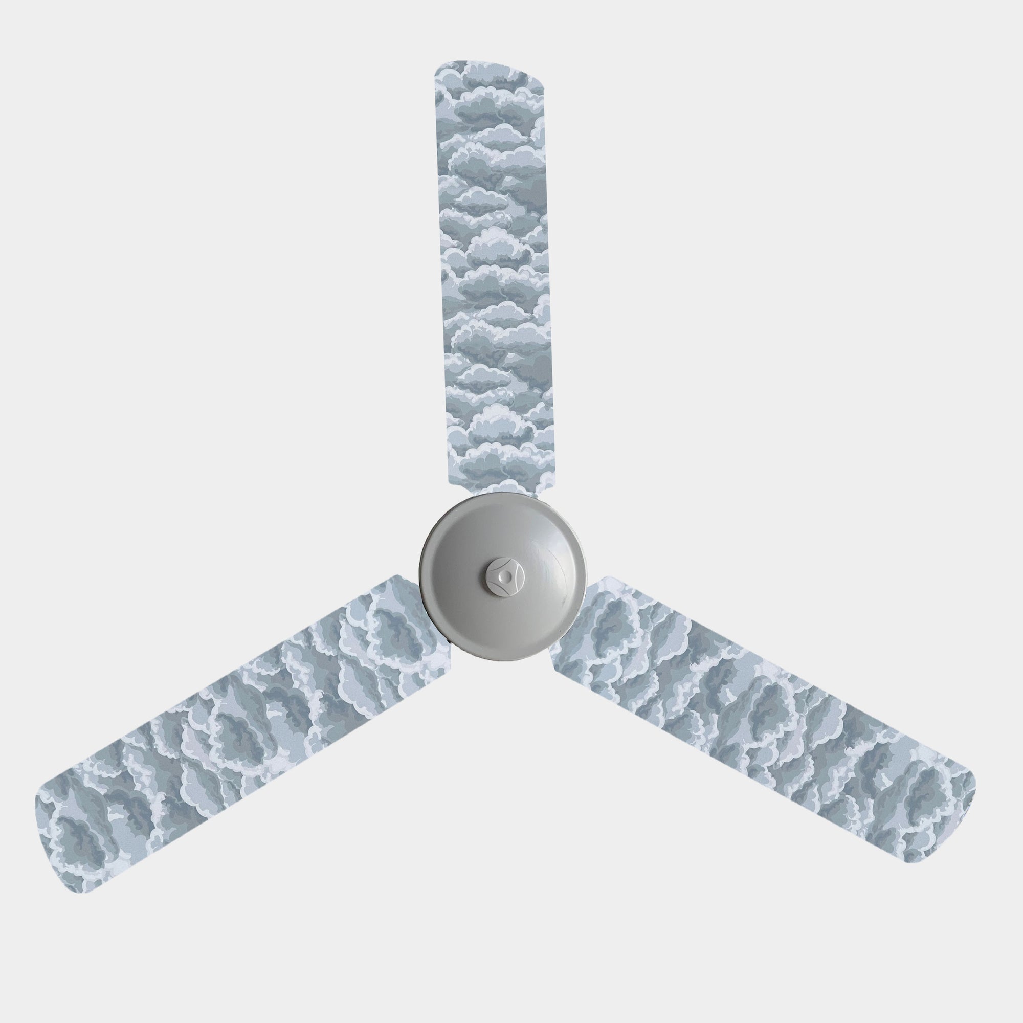 Grey and white storm cloud fan blade covers on a 3 blade fan