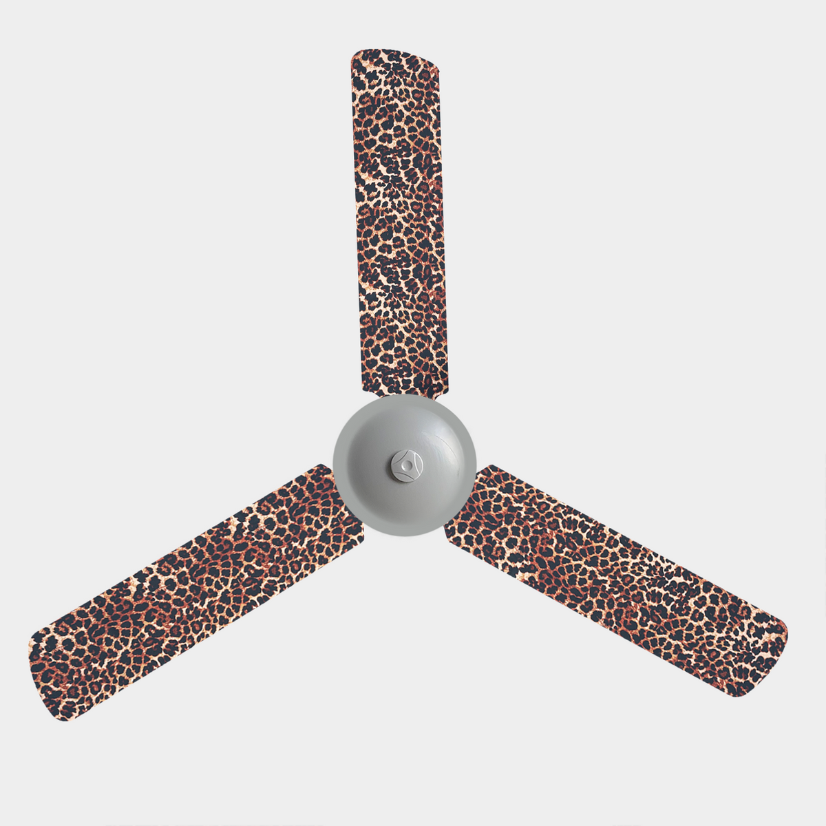3 blade ceiling fan with leopard print fabric covers on the blades 