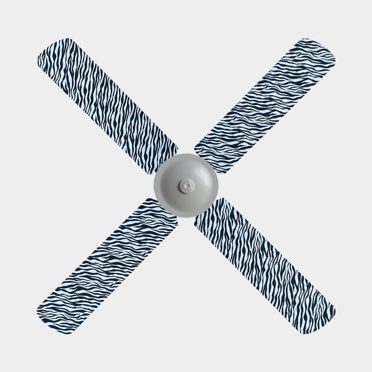 Zebra print fabric fan blade covers on a 4 blade ceiling fan