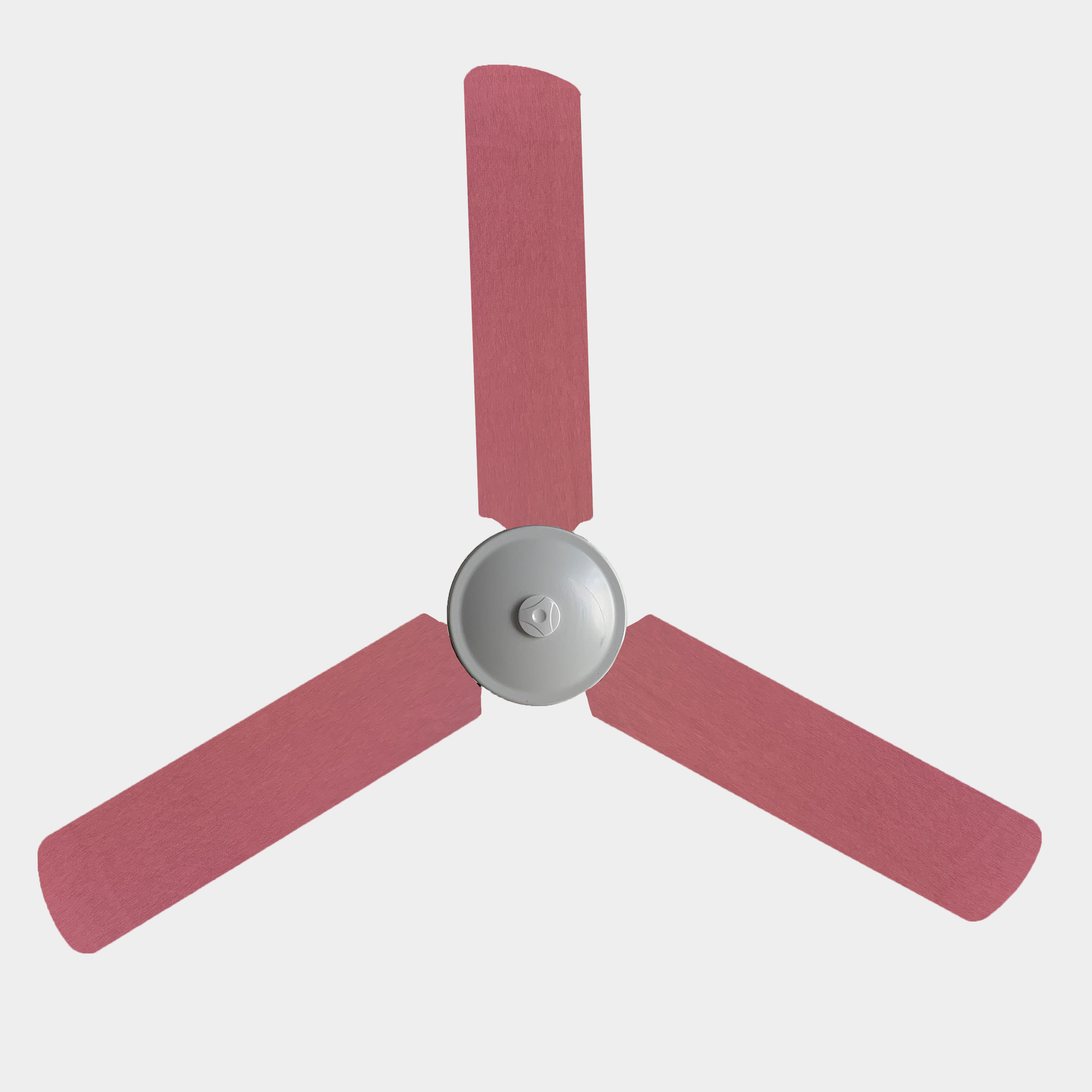 Pink blush fan blade covers on a three bladed ceiling fan
