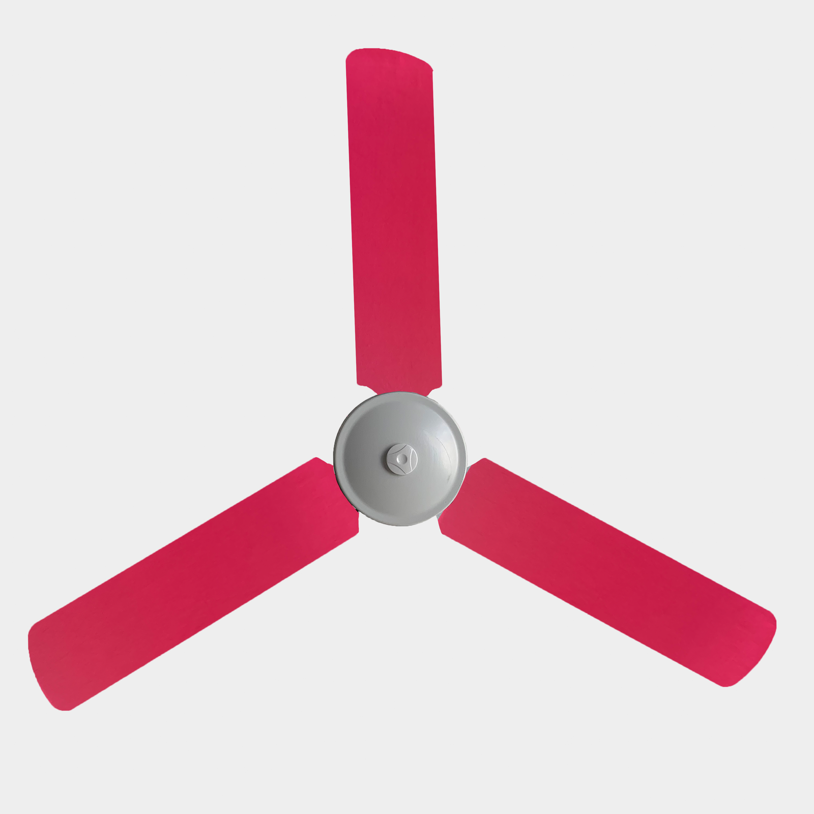 Bright pink fan covers on three blade ceiling fan