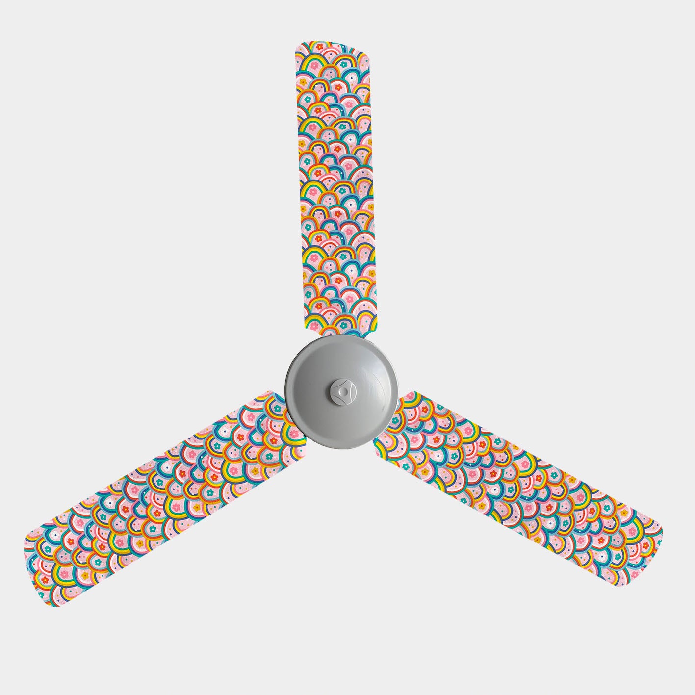 Ceiling fan covers with red, yellow, blue rainbows with small flowers on a pink background pattern