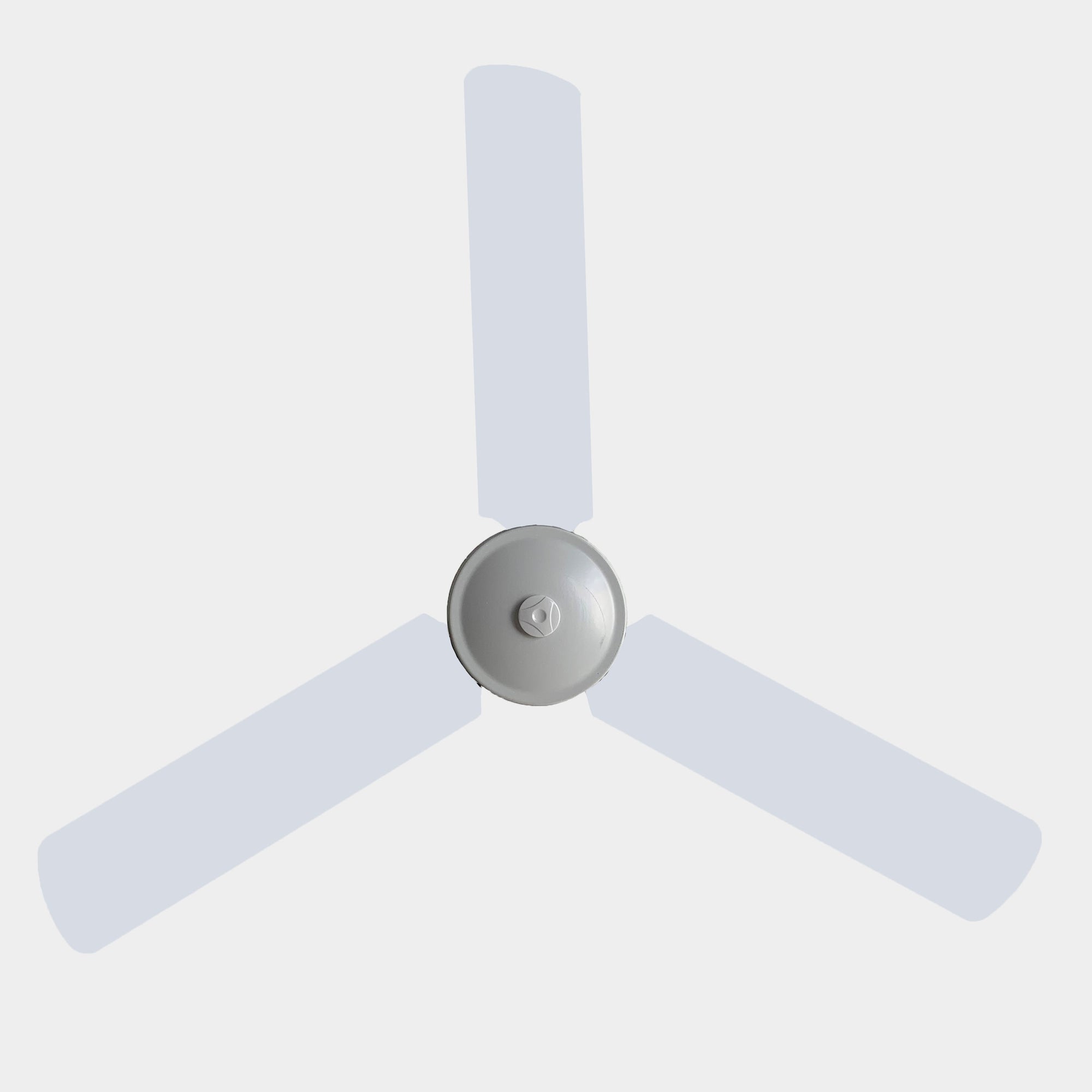 White fan blade covers on a three bladed fan