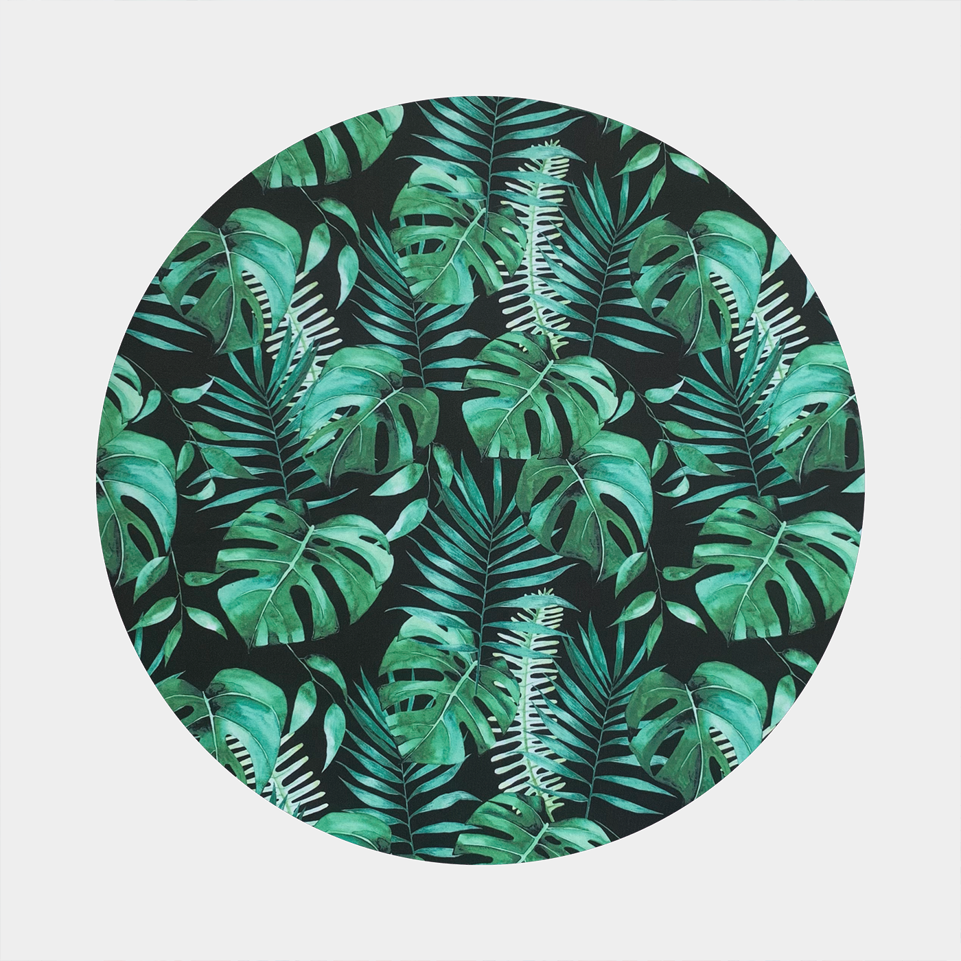 Pattern with black background and large green leaves and ferns