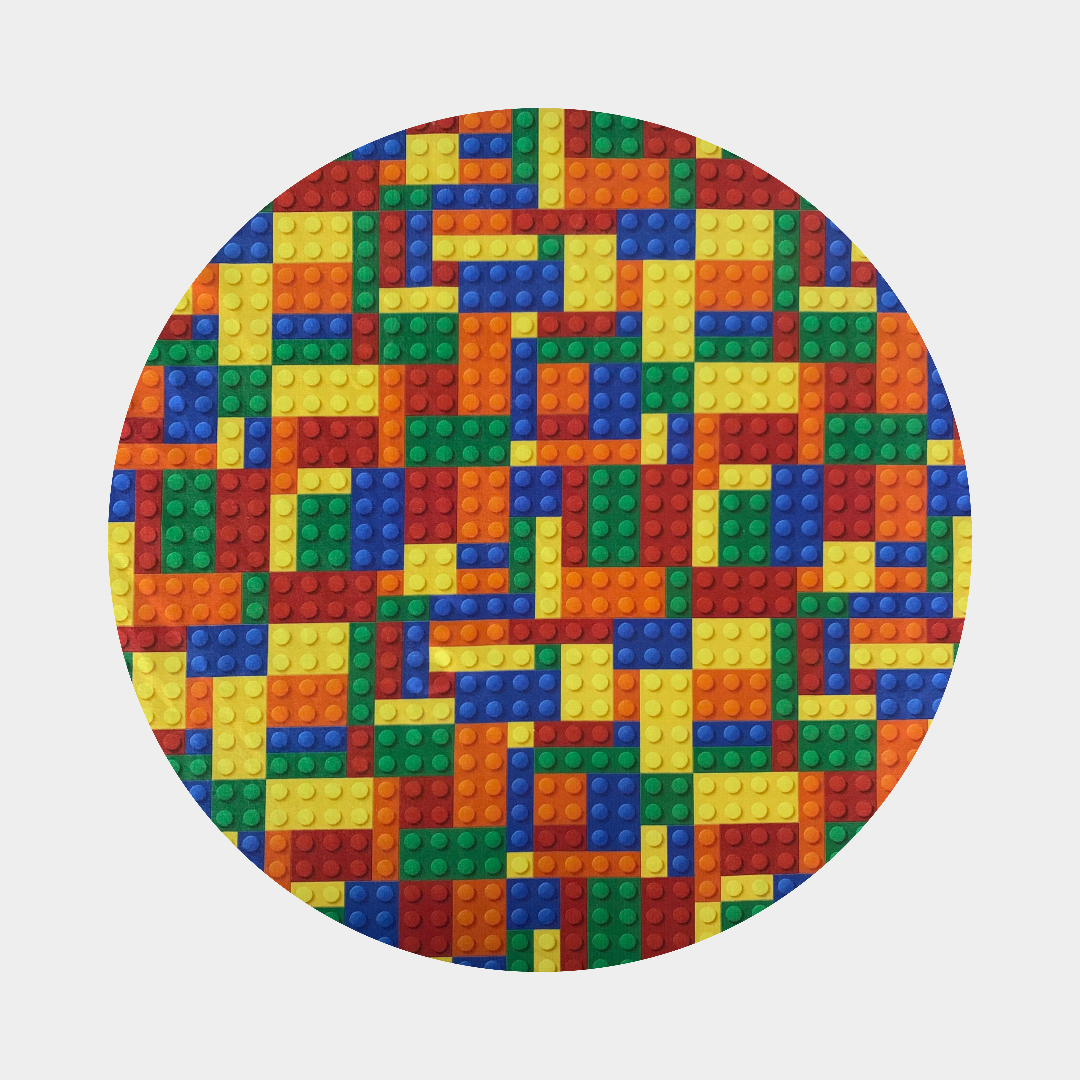 Pattern of blue, yellow, red, orange, and green toy bricks